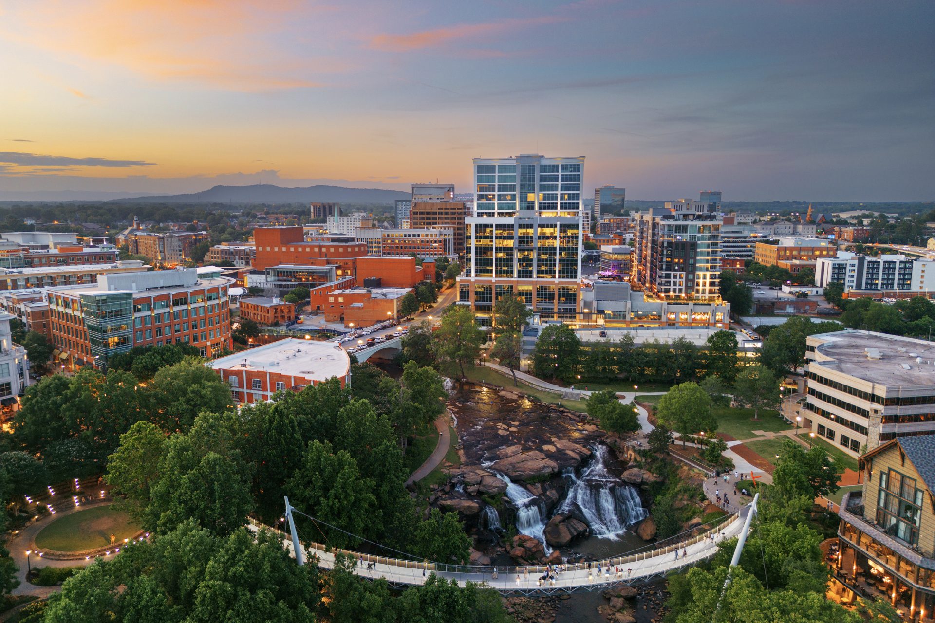 Aerial view of Falls Park and downtown Greenville, South Carolina, at sunset