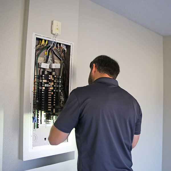 ProTech inspector checking an electrical panel